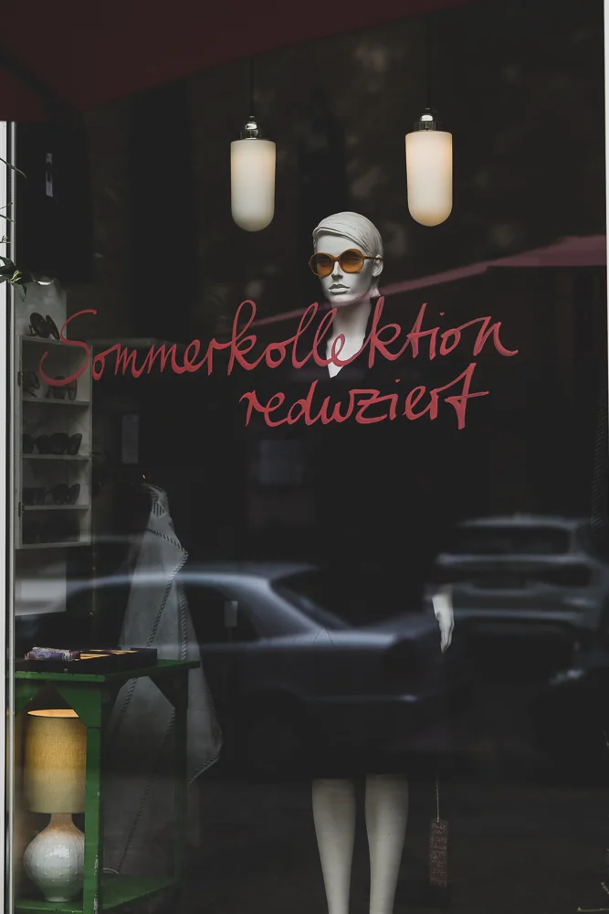 Woman in the window. Photograph by Adelina Persa.
